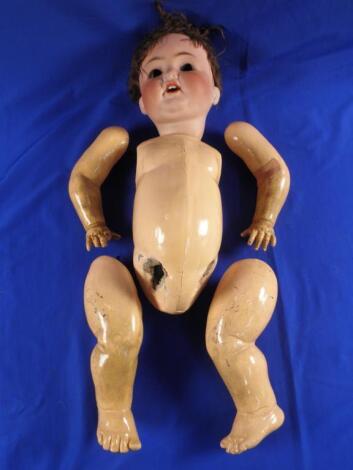 A Heubach and Koppelsdorf bisque headed doll