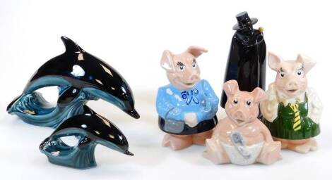 A graduated pair of Poole Pottery dolphin figures, 20cm high, Natwest Pigs, etc. (a quantity)