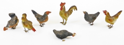 A set of seven unusual early/mid 20thC cockerel and hen ornaments, 8cm high, with metal mounts and papier maché style bodies. (a quantity, AF)