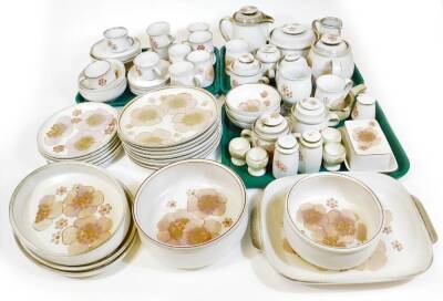 A Denby floral pattern part dinner service, to include serving dish, 38cm wide, teapot, open vegetable dishes, coffee pot, cups, saucers, plates, butter dish, cruet, side plates, dishes, bowls, etc. printed marks beneath. (a quantity)