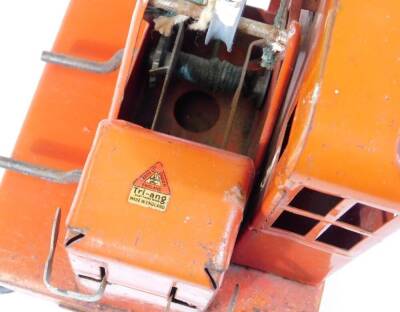 Various tin plate toys, Tonka T-6 orange bulldozer, 12cm high, a tin plate Massey Harris tractor with trailer and a Tri-ang crane in orange and black colour way with bucket. (a quantity) - 4