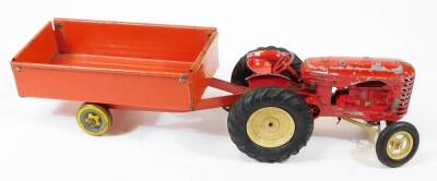 Various tin plate toys, Tonka T-6 orange bulldozer, 12cm high, a tin plate Massey Harris tractor with trailer and a Tri-ang crane in orange and black colour way with bucket. (a quantity) - 5