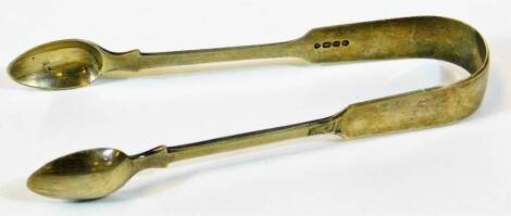 A pair of Victorian silver sugar bows, fiddle pattern, London 1858, 14cm wide.