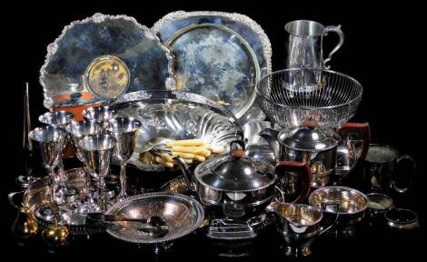 Various silver plated ware, a dish with engraved marks to the centre and pie crust shell and scroll outline, by the Adie Brothers, 27cm wide, shallow dish, footed bowl, entree dish with cover, table lighter, three piece tea service, basket with swing hand