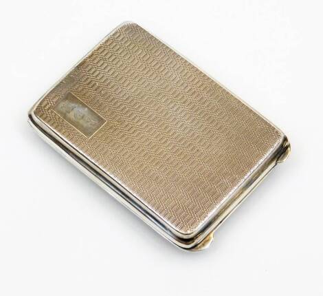 A George V silver matchbox case, of oblong form partially engine turned, with thumb mould handle, initialled EGH, Birmingham 1927, 6cm wide, 1.2oz.