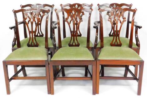 A set of six (4+2) 20thC mahogany Chippendale design dining chairs, each with shaped ear cresting rails, inverted pierced ribbon back splats and drop in seats in green material on plain legs joined by a H stretcher, each carver with shaped arms and invert