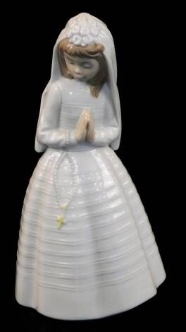 A Nao figure of a girl in wedding dress, printed marks beneath, 24cm high.