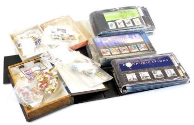Various stamps and philately, Royal Mail mint collectors stamps, Classic Sports Cards, Various sets, Football Legends, Robert Burns, Christmas Robins, Channel Tunnel, Swans, a book shaped box containing various loose plastic stamp holders, various other l