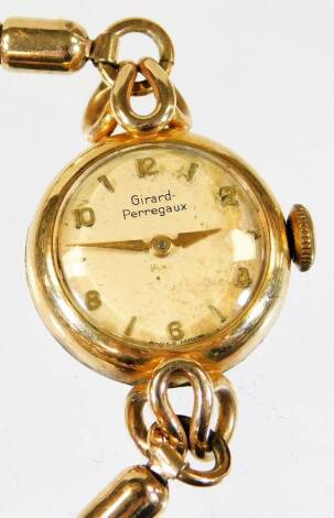 A 20thC Girard-Perregaux ladies cocktail watch, with 2cm diameter dial and elasticated bracelet in untested gold case.