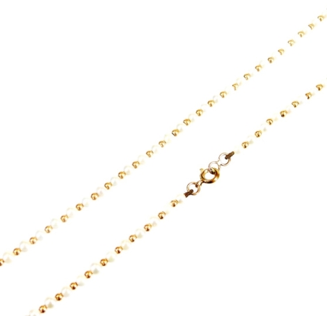 A seed pearl and orb necklace, with plain clasp, marked 9ct, 40cm long.