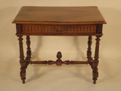 A continental walnut side table