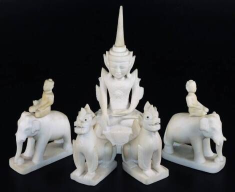 Carved stone figures, of temple lions, elephants and Hindu Goddess, the tallest 33cm. (5)