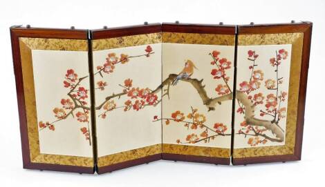 A table screen with fabric and painted panels, 32cm high.