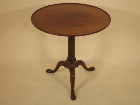 An early 19thC mahogany tilt top table