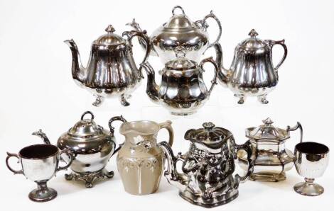 A collection of Victorian silver lustre pottery, comprising seven teapots, two goblets and a jug. (10)