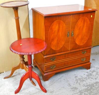 A TV cabinet, 93cm high, 82cm wide, 44cm deep, tripod jardiniere stand and a tripod table.