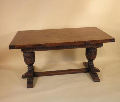 An oak draw leaf dining table in 17thC style