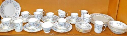 A Colclough Rhapsody in blue pattern part dinner service, to include sandwich plate, 27cm wide, milk jug, cups, saucers, dinner plates, side plates, dessert bowls, etc. (1 shelf)