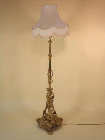 A late 19thC brass standard lamp