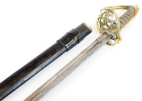 An officer's sword, with steel blade stencilled with flowers and marked Lancashire, with a pierced basket weave handle initial VR with a crown, with turned grip and compressed pommel with leather scabbard, 98cm wide.