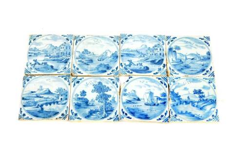 Eight 18thC Dutch delftware tiles, decorated with landscapes and riverscapes within circular reserves, 12.5cm.