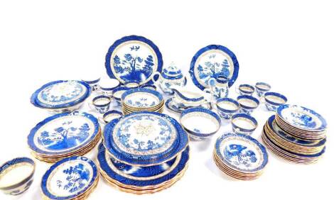 A Booths pottery part dinner tea and coffee service, decorated in the Real Old Willow pattern, A8025, comprising a pair of vegetable tureens and cover, gravy boat on stand, six dinner dessert and side plates, six fruit bowls, eight cereal bowls, nine teac