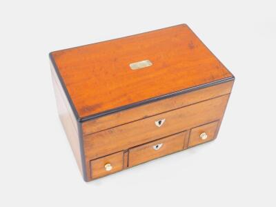 A Georgian satinwood and rosewood banded jewellery box, of rectangular section, with a hinged lid, the front with mother of pearl key escutcheons and three frieze drawers, 14cm high, 23cm wide, 14.5cm deep. - 2