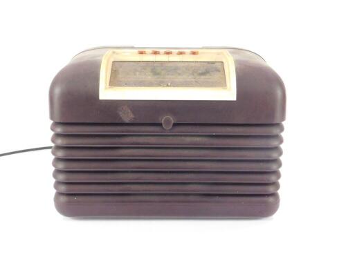 A Bush brown Bakelite cased radio, type DAC.10, serial no 62/01770, 32.5cm W.