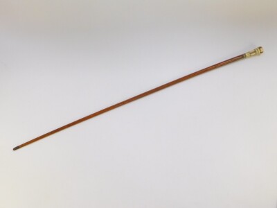 A Georgian malacca lady's pomander cane, the ivory handle with silver pique decoration, unscrewing to reveal the pomander, 91.5cm high. - 2