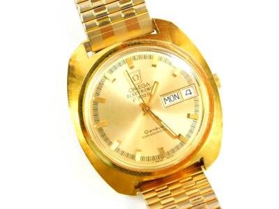 An Omega gentleman's gold plated electronic chronometer wristwatch, Ff300, Hz, gilt dial with batons, centre seconds, date aperture, on an expanding bracelet.