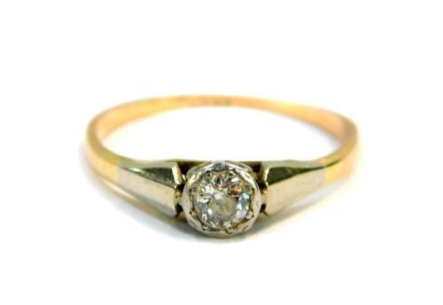 A rose cut diamond solitaire ring, set in yellow and white metal, approximately 0.3cts, size N, 1.7g.