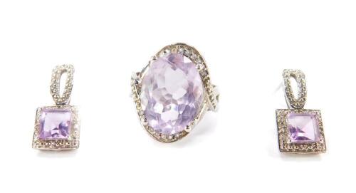 A silver Rose de France amethyst and white topaz ring, amethyst 8.22cts, size L/M, together with a pair of matching earrings, amethysts 2.00cts, with certificate.