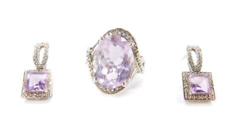 A silver Rose de France amethyst and white topaz ring, amethyst 8.22cts, size L/M, together with a pair of matching earrings, amethysts 2.00cts, with certificate.