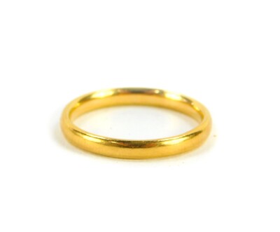 A 22ct gold wedding band, size O, 3.3g.