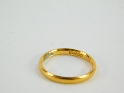 A 22ct gold wedding band, size O, 3.3g. - 2