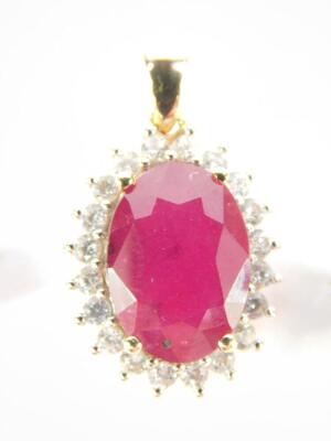 A 9ct gold Madagascar ruby and zircon pendant, ruby 8.05cts, 1.81g gold, and a pair of silver Madagascan ruby and white topaz earrings, rubies approx 5cts, with certificate. - 2