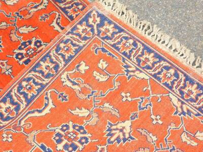 A Caucasian red ground rug, decorated with floral and foliate motifs, 170cm x 88cm. - 3