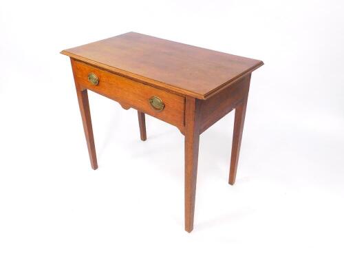 A George III oak side table, with single frieze drawer, raised on tapering square legs, 83cm wide, 47cm deep, 73cm high.