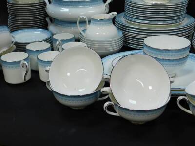 A Royal Doulton porcelain dinner tea and coffee service, decorated in the Lorraine pattern, comprising pair of oval meat platters, four vegetable tureens and three covers, pair of sauce boats, eleven dinner twelve dessert and eleven side plates, twelve fr - 3