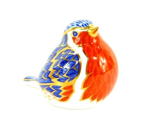 A Royal Crown Derby porcelain paperweight modelled as a Robin, printed mark.