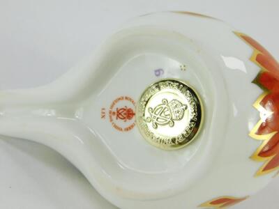 A Royal Crown Derby porcelain paperweight modelled as a Robin, printed mark. - 2