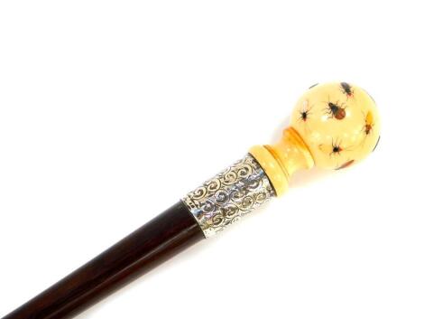 A rosewood walking stick, with an ivory ball knop, Shibayama decorated with insects, signed, silver ferrule with foliate scroll engraving, shield reserve, brass capped, 88.5cm high.