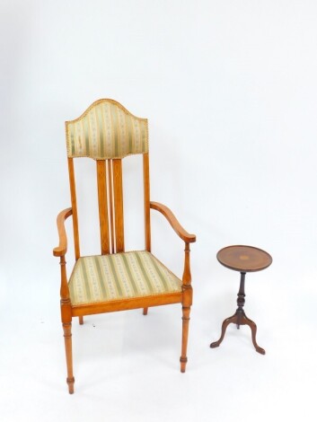 A Victorian mahogany and ivory line inlaid carver chair, with upholstered head rest and seat, raised on turned legs, together with a mahogany and inlaid wine table, with sunburst paterae, raised on a baluster turned column, over three cabriole legs, 26cm 