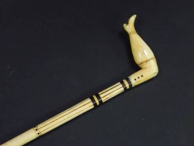 A 19thC whale bone walking cane, the partially fluted shaft with baleen washers, the sperm whale tooth handle carved as a Victorian lady's leg, 85.5cm high. - 2