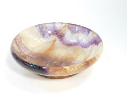 A Blue John circular dish, 14cm diameter. (AF)