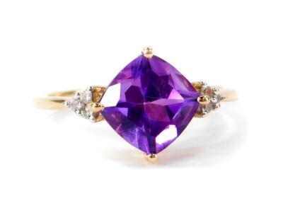 A 9ct gold amethyst and zircon ring, the cushion cut amethyst 2.02cts, size L/M, 1.87g gold, with certificate.