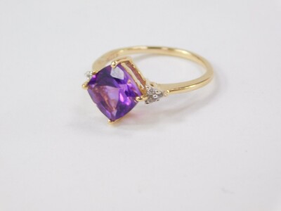 A 9ct gold amethyst and zircon ring, the cushion cut amethyst 2.02cts, size L/M, 1.87g gold, with certificate. - 2