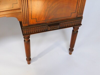 A George IV mahogany and ebony line inlaid sideboard, with splash back, two central drawers flanked by a pair of cupboard doors, raised on turned and fluted cylindrical legs, 112cm high, 151.5cm wide, 54cm deep. - 3