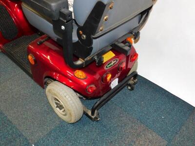 A FreeRider Mayfair red mobility scooter, model FR168-4, with battery and instructions. - 3