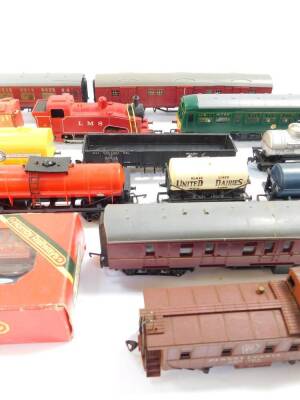 A OO gauge diesel locomotive M79079, three Tri-ang coaches, wagons and a Lima LMS tank engine 8920. (quantity) - 3